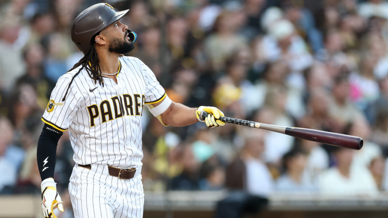 Fernando Tatis Jr. watches a home run during a Padres game as speculation grows over a potential Yankees blockbuster trade.