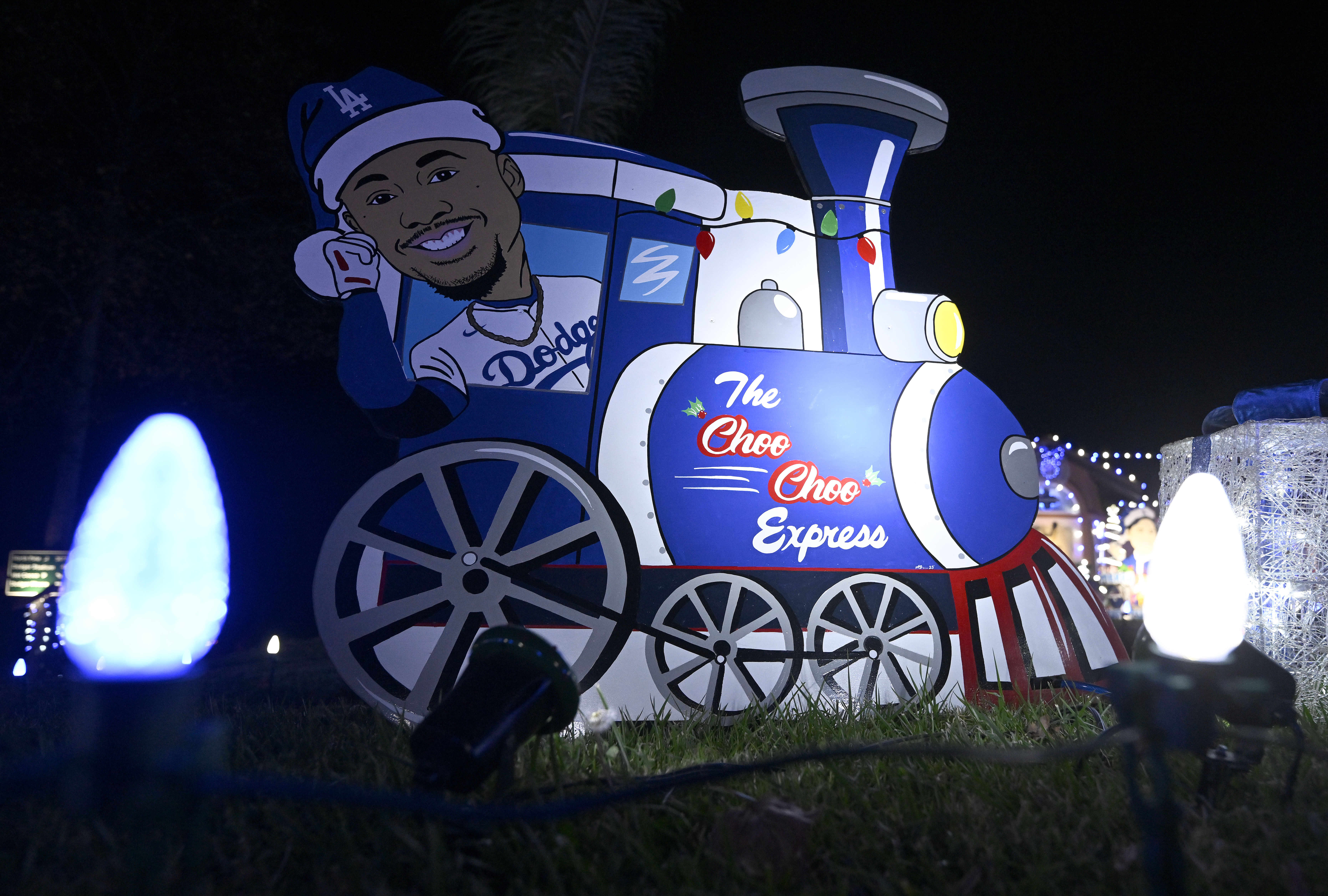 A cutout of Los Angeles Dodgers’ player Mookie Betts is...