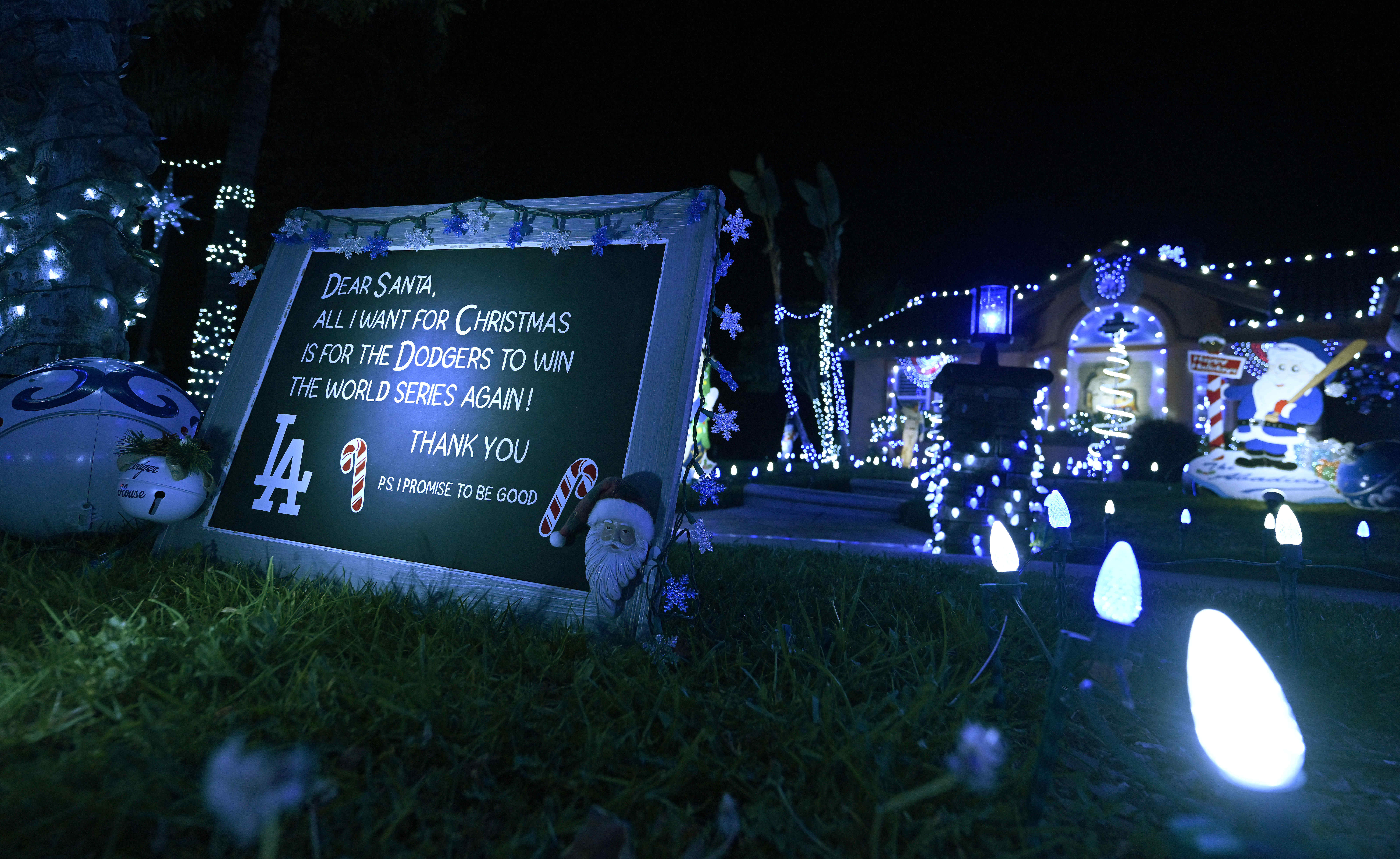 A sign, seen Thursday, Dec. 11, 2025, outside the Dodger...