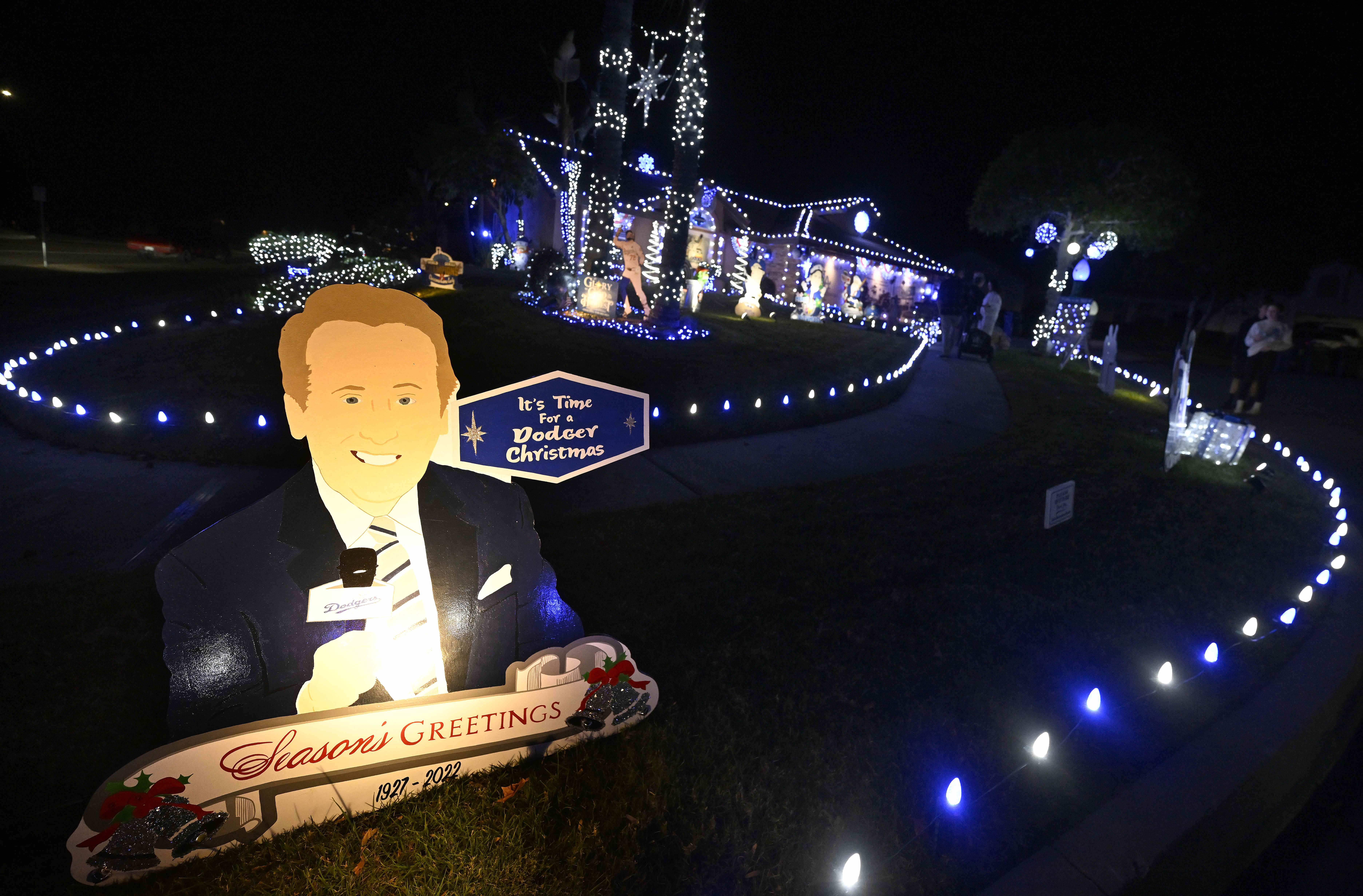 A cutout of late Los Angeles Dodgers broadcaster Vin Scully...