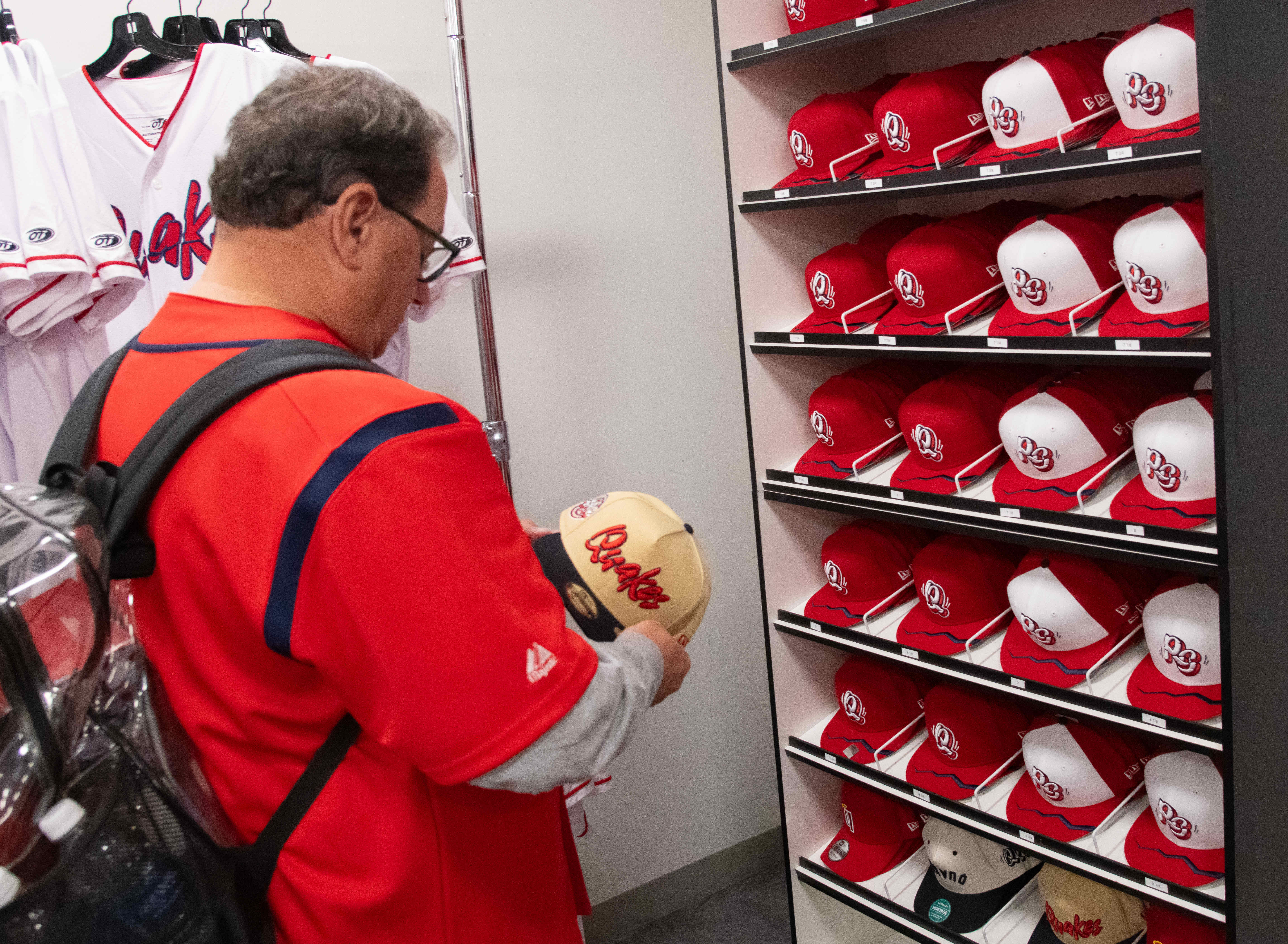 La Verne resident Bruce Svatos examines new Rancho Cucamonga Quakes...
