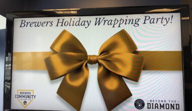 Brewers wrap $5,000 in toys for Milwaukee kids for All Hands On Deck event