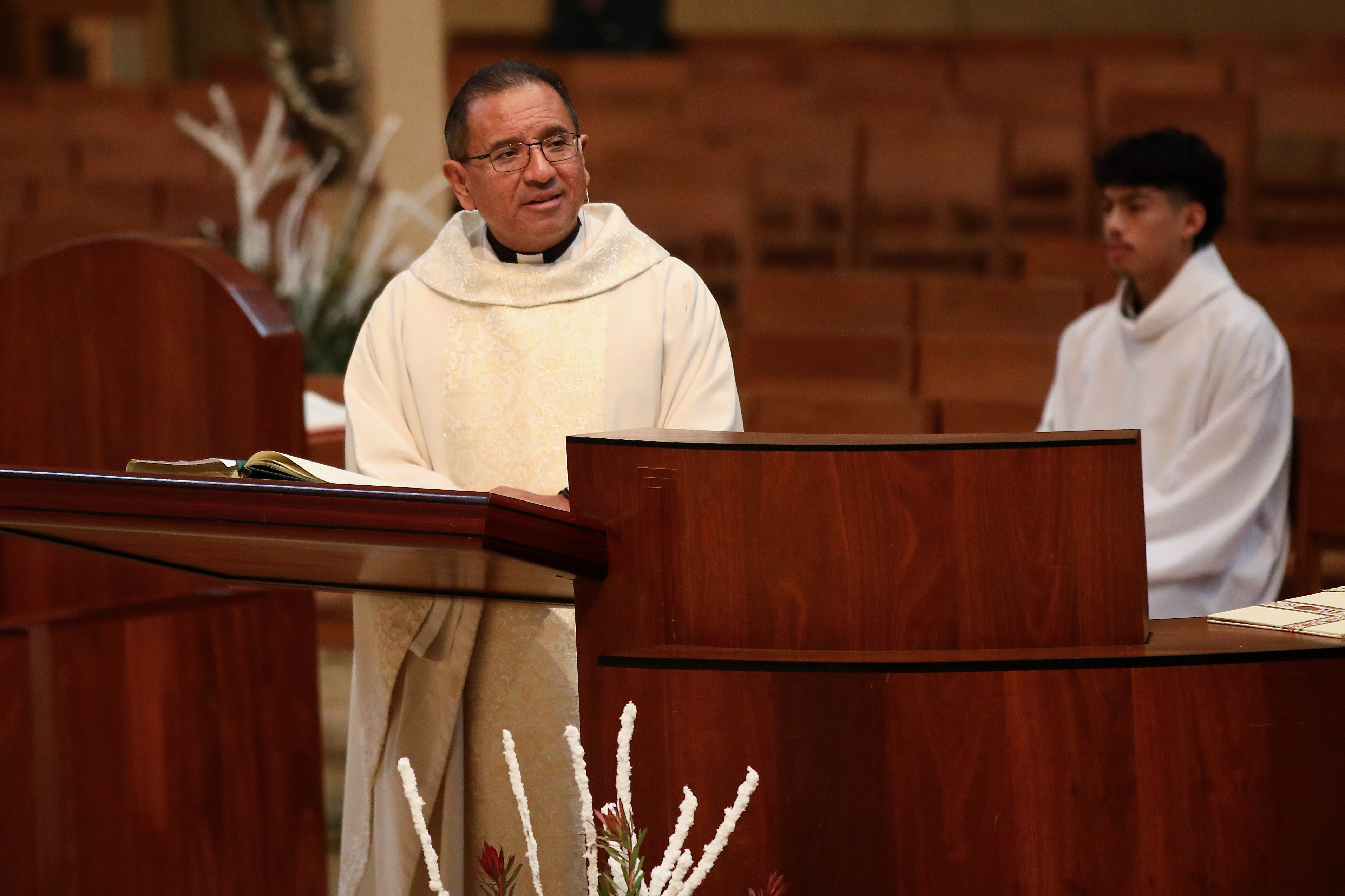 The Rev. David Gallardo presides over Christmas Day Mass at...
