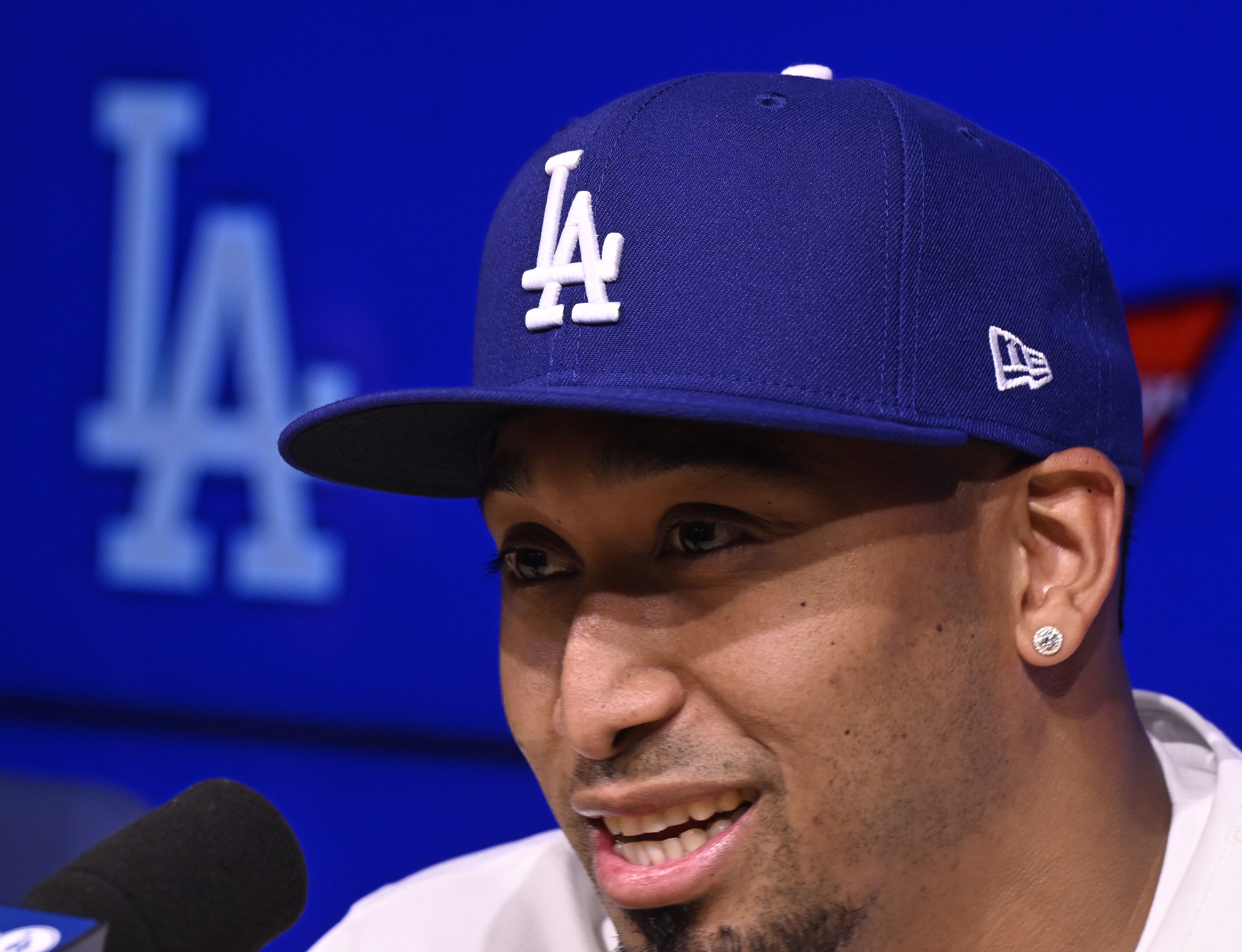 Newly signed Dodgers relief pitcher Edwin Diaz speaks to reporters...