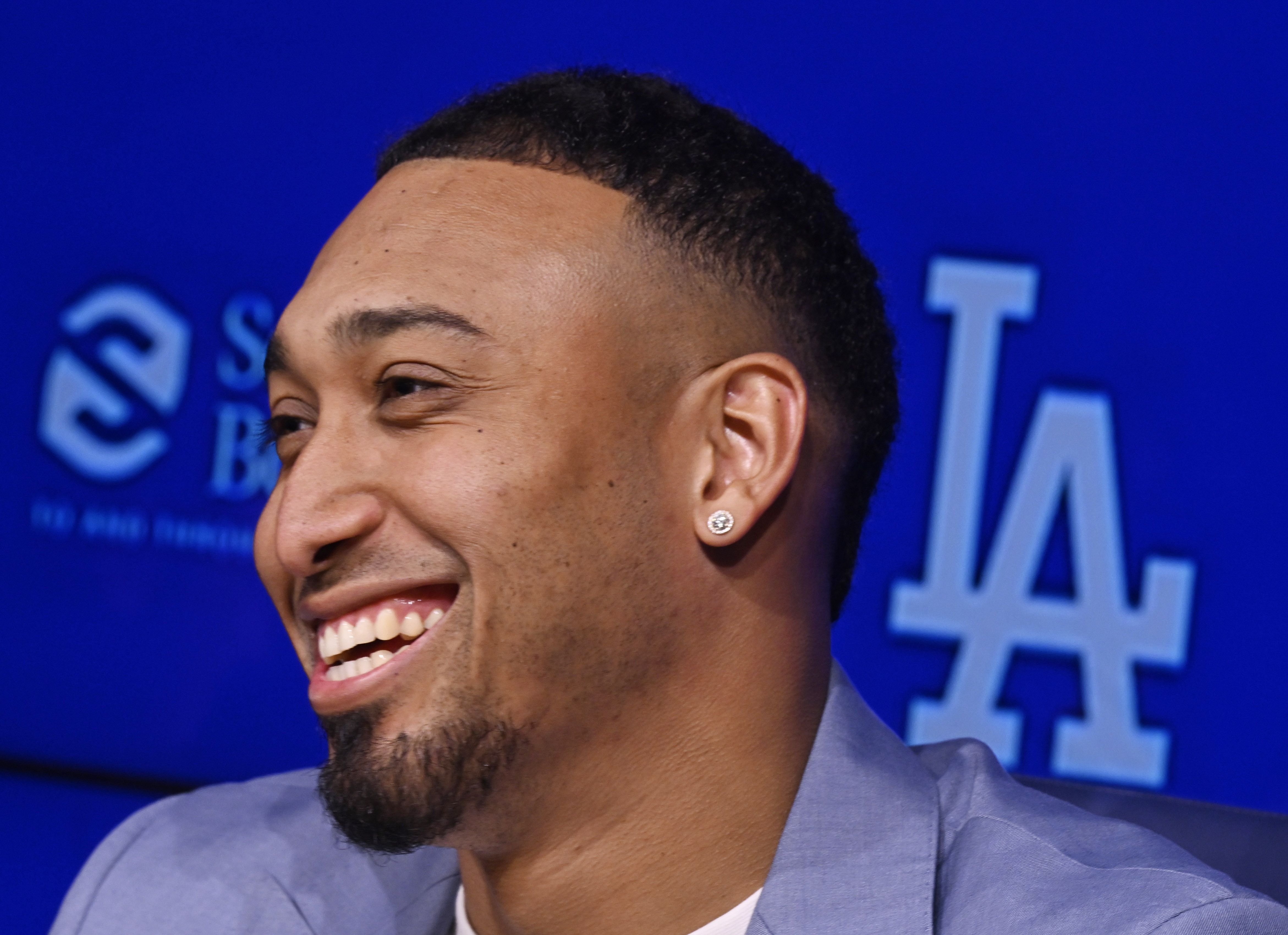 Newly signed Dodgers relief pitcher Edwin Diaz speaks to reporters...