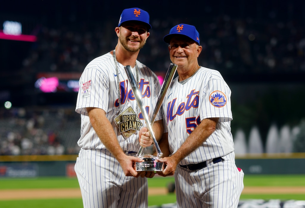 DENVER, COLORADO - JULY 12: Pete Alonso #20 of the New York Mets poses with Bench Coach Dave Jauss after winning the 2021 T-Mobile Home Run Derby at Coors Field on July 12, 2021 in Denver, Colorado.