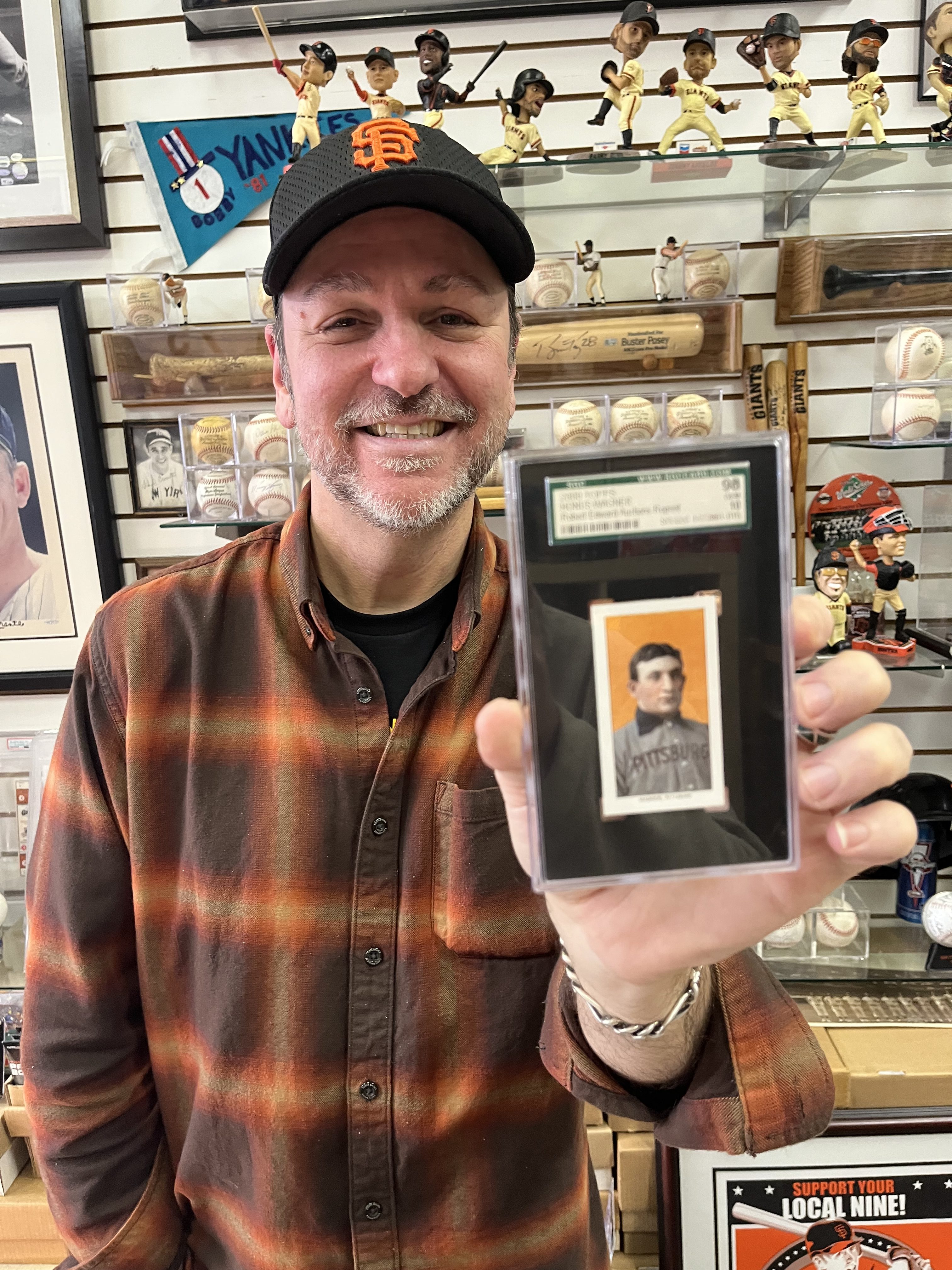 Bobby Michener of Diamond Sports Cards in San Rafael poses...