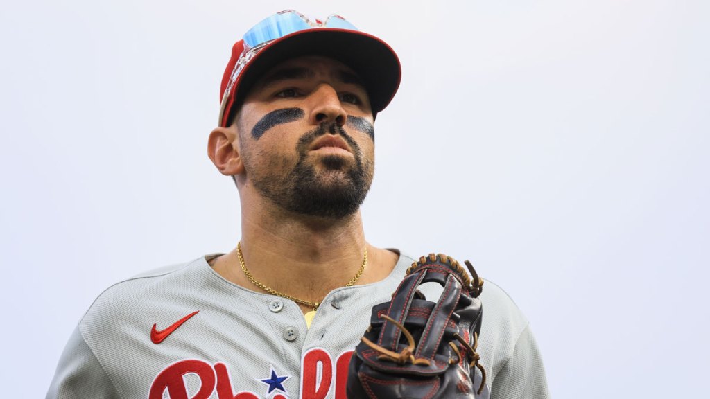 Philadelphia Phillies outfielder Nick Castellanos (8) runs off the field at the end of the third inning against the Cincinnati Reds at Great American Ball Park.
