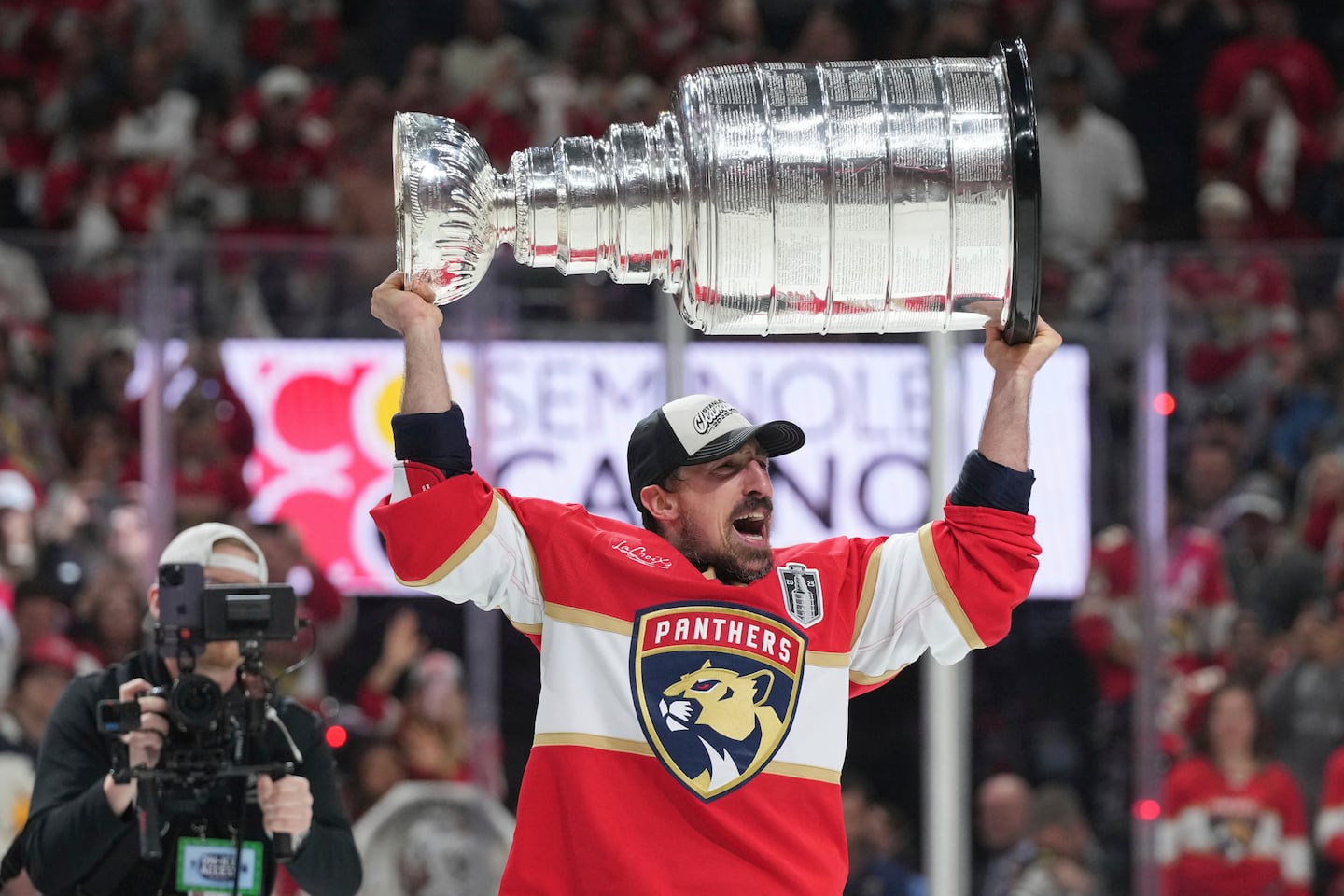 Brad Marchand lifted the Stanley Cup again in 2025, this time as a member of the Florida Panthers.