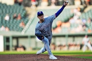 Texas Rangers starting pitcher Jacob Latz delivers during the second inning of a baseball...