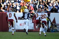 Dallas Cowboys wide receiver Kavontae Turpin (9) heads for the end zone to score on a...