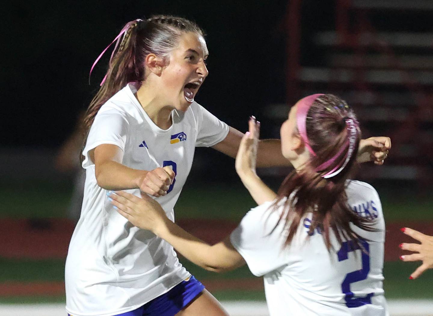 Johnsburg's Charlie Eastland (left) is congratulated by teammate Devynn Michel after scoring the go-ahead goal to put them up 2-1 over Timothy Christian with less than a minute left in the game Thursday, June 5, 2025, during their IHSA Class 1A state semifinal game at North Central College in Naperville.