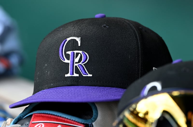 WASHINGTON, DC - JUNE 19: A view of a Colorado Rockies baseball cap in the dugout during the game against the Washington Nationals at Nationals Park on June 19, 2025 in Washington, DC. (Photo by G Fiume/Getty Images)