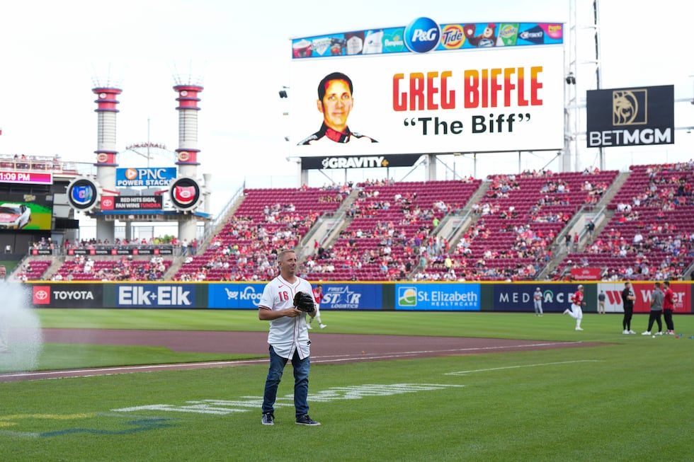 NASCAR driver Greg Biffle looks on prior to a baseball game between the Cleveland Guardians...