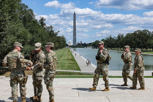 Members of the West Virginia National Guard patrol the National Mall in front of the Lincoln Memorial on Wednesday, August 28, 2025 in Washington, D.C.