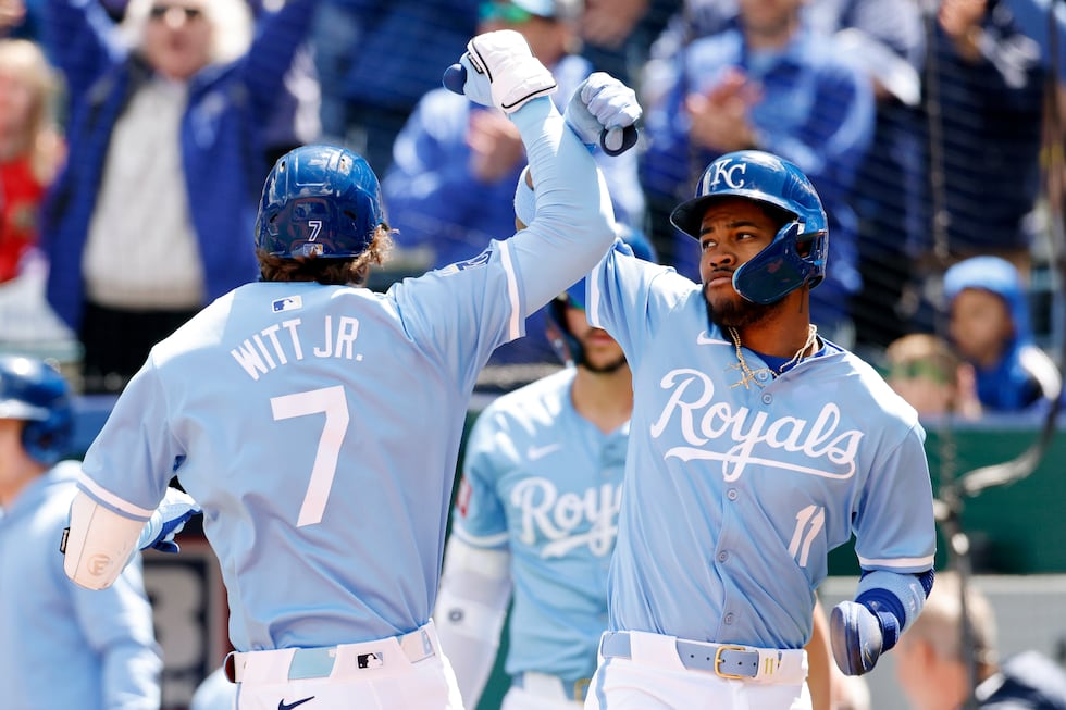 Kansas City Royals' Bobby Witt Jr. (7) celebrates hitting a two-run home run with Maikel...