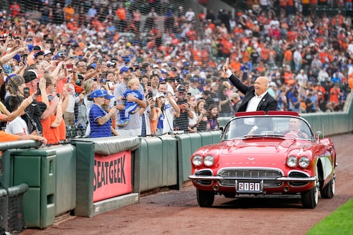 Cal Ripken Jr. waves to fans as he rides on a convertible at Oriole Park at Camden Yards in Baltimore, Md., on Saturday, Sept. 6, 2025. Saturday is the 30th Anniversary of Cal Ripken Jr.’s achievement to play 2,131 games in a row, breaking Lou Gehrigh’s record, and cementing his own place in MLB history as the ‘Iron Man.’
