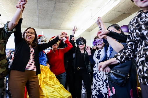 Members of the Love Vietnamese Seniors Club enjoy karaoke and dancing at Holiday Park Senior Center on Friday, October 31, 2025 in Silver Spring, MD.