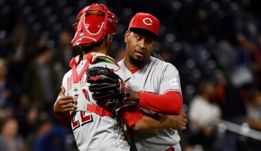 Cincinnati Reds catcher Luke Maile and closing pitcher Alexis Diaz celebrate a 3-1 win in a baseball game against the Colorado Rockies Tuesday, May 16, 2023, in Denver. (AP Photo/Geneva Heffernan)