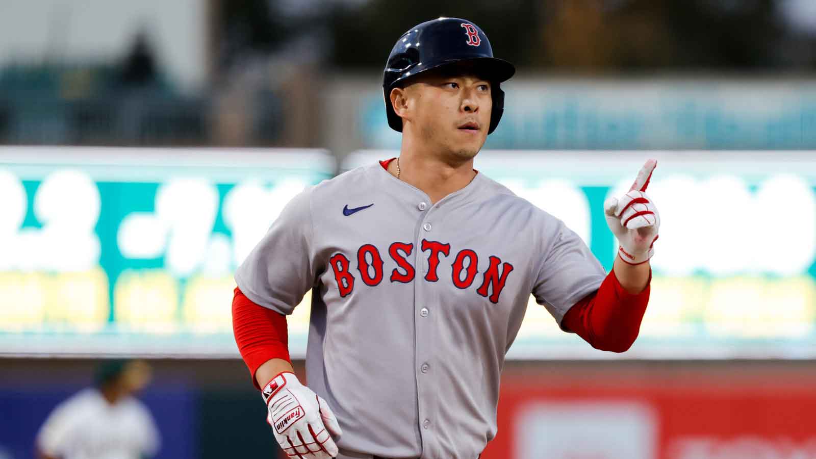Boston Red Sox designated hitter Rob Refsnyder (30) rounds the bases after hitting a three run home run during the first inning against the Athletics at Sutter Health Park.
