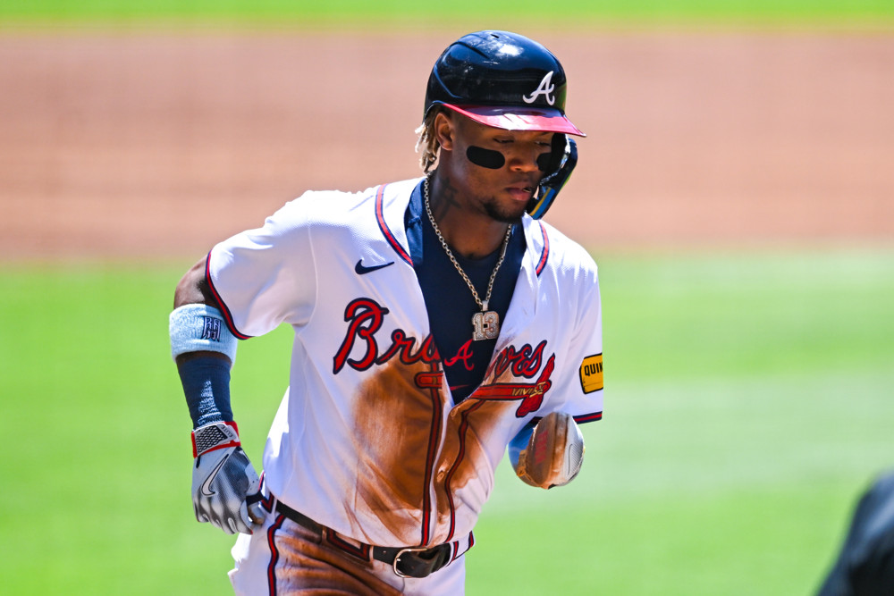 ATLANTA, GA Ð MAY 20: Atlanta outfielder Ronald Acuna Jr. (13) scores a run during the first game of a MLB doubleheader between the San Diego Padres and the Atlanta Braves on May 20th, 2024 at Truist Park in Atlanta, GA. (Photo by Rich von Biberstein/Icon Sportswire)