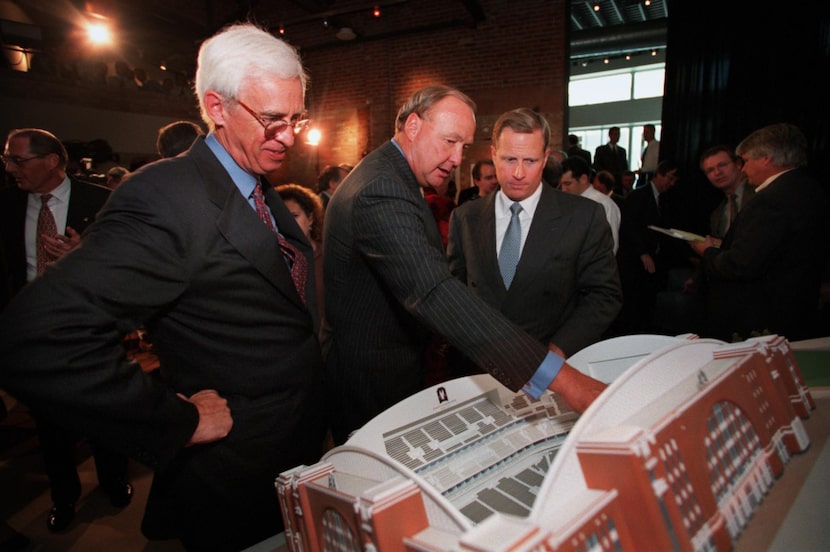 Don Carty, American Airlines Chairman and CEO (left), Tom Hicks, Dallas Stars Owner (center)...