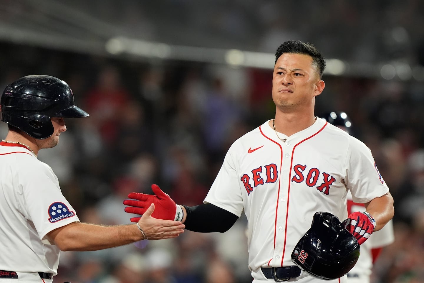 FILE Boston Red Sox Rob Refsnyder is congratulated after hitting a home run against the Athletics in the second inning of a baseball game, Sept. 17, 2025, in Boston. (AP Photo/Robert F. Bukaty, File)