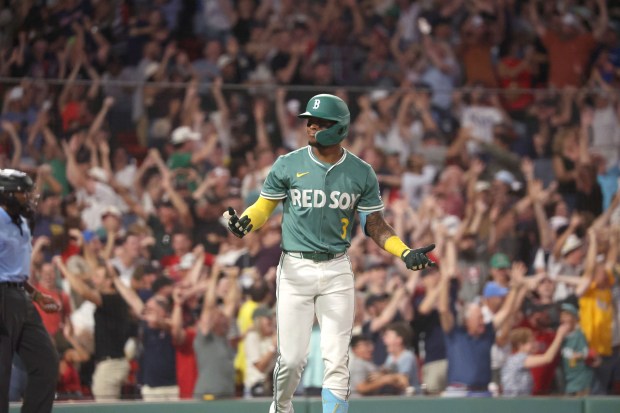 Boston Red Sox center fielder Ceddanne Rafaela (3) signals after hitting his 2 run walk off homer as the Sox take on the Rays at Fenway. (Staff Photo By Stuart Cahill/Boston Herald)