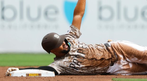 Xander Bogaerts #2 of the San Diego Padres celebrates a two-run double in the first inning against the Arizona Diamondbacks at Petco Park on Sept. 28, 2025 in San Diego, California. (K.C. Alfred / The San Diego Union-Tribune)