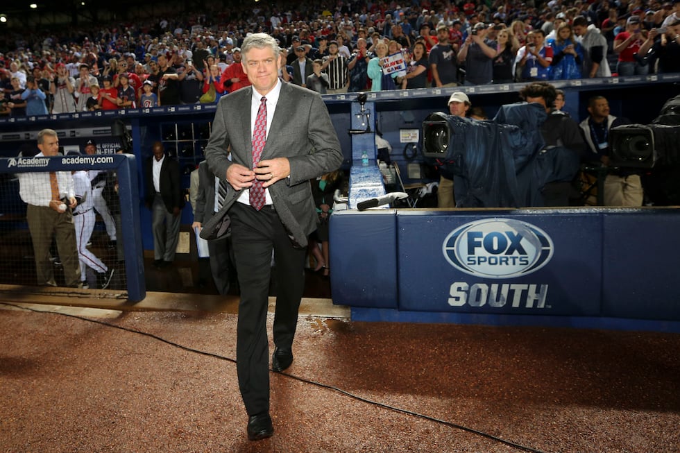 Former Atlanta Braves great Dale Murphy walks on to the field for a pre-game ceremony before...