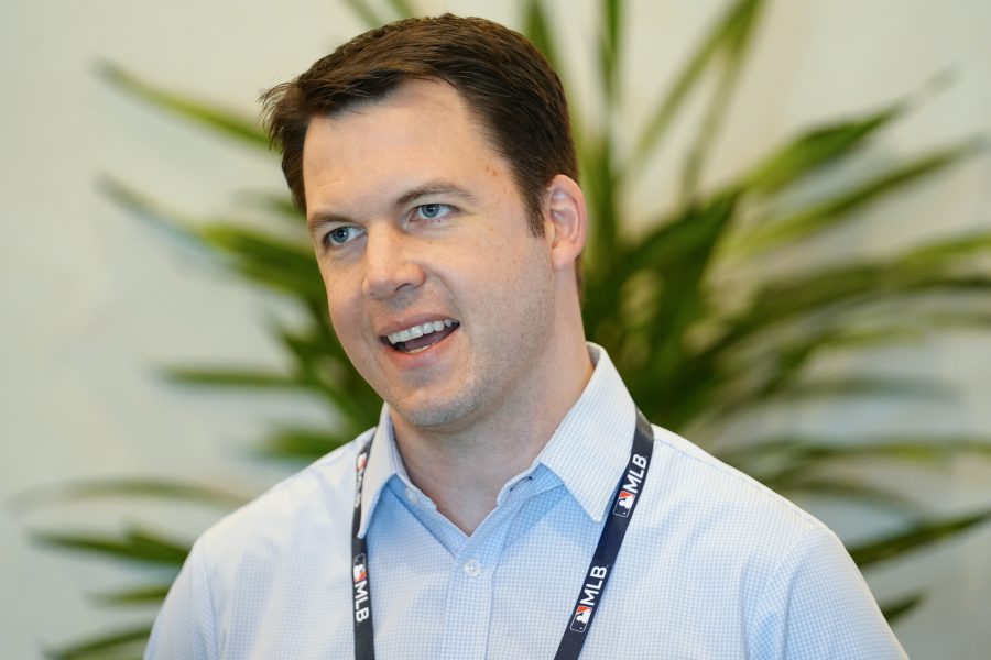 Chicago Cubs general manager Carter Hawkins answers questions from the media during the MLB GM Meetings at The Conrad Las Vegas.