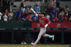 Aug 13, 2025; Arlington, Texas, USA; Arizona Diamondbacks second baseman Ketel Marte (4) reacts as he circles the bases after hitting a three-run home run during the ninth inning against the Texas Rangers at Globe Life Field. Mandatory Credit: Raymond Carlin III-Imagn Images
