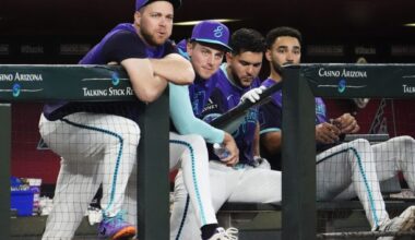 Arizona Diamondbacks starting pitchers Corbin Burnes and Brandon Pfaadt in the dugout.