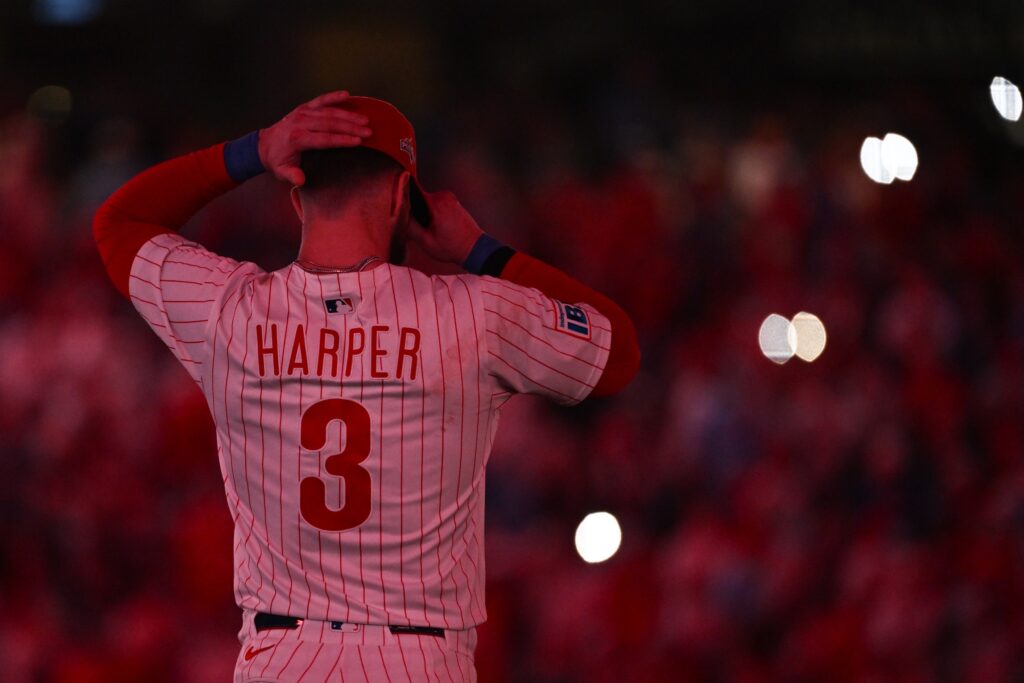 Oct 6, 2025; Philadelphia, Pennsylvania, USA; Philadelphia Phillies first baseman Bryce Harper (3) looks on at the start of the ninth inning during game two of the NLDS round against the Los Angeles Dodgers for the 2025 MLB playoffs at Citizens Bank Park.
