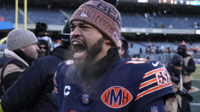 Dec 14, 2025; Chicago, Illinois, USA; Chicago Bears quarterback Caleb Williams (18) celebrates after defeating the Cleveland Browns at Soldier Field. Mandatory Credit: David Banks-Imagn Images