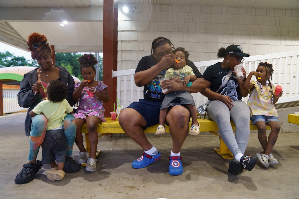 The Claibornes enjoy ice cream all together at The Cow in Reisterstown, Md. on July 1, 2025. The family, who is local to the area, said that it is their second time coming.