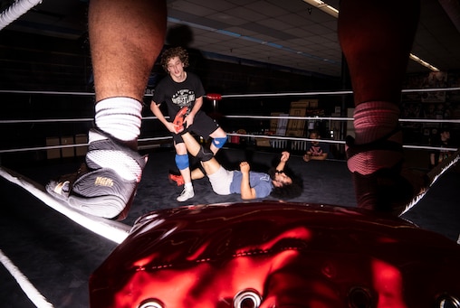 Kelly Burkhart grabs Tony Macko by the foot inside of the ring at MCW Pro Wrestling Training Center in Joppa, March 27, 2025.