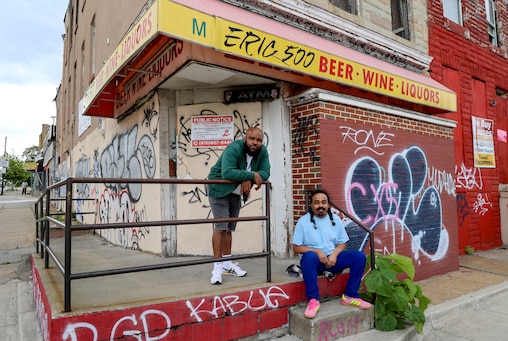 Brian Ennals, left, and Tariq “Infinity Knives” Ravelomanana in front of the shop Eric 500.