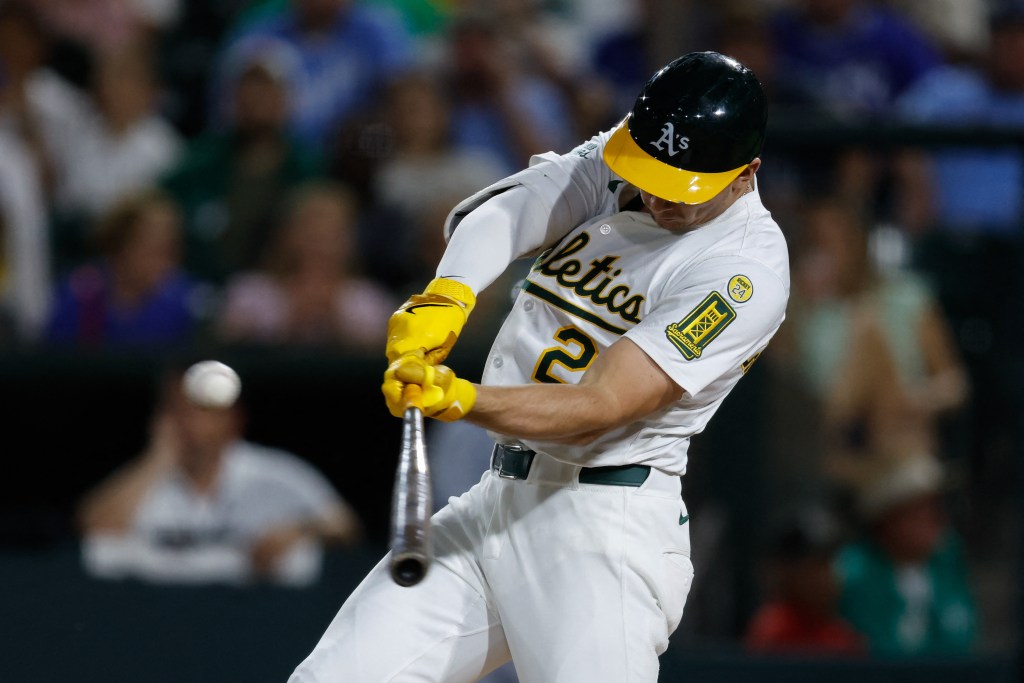 Athletics left fielder Tyler Soderstrom (21) hits a double during the first inning against the Kansas City Royals at Sutter Health Park.