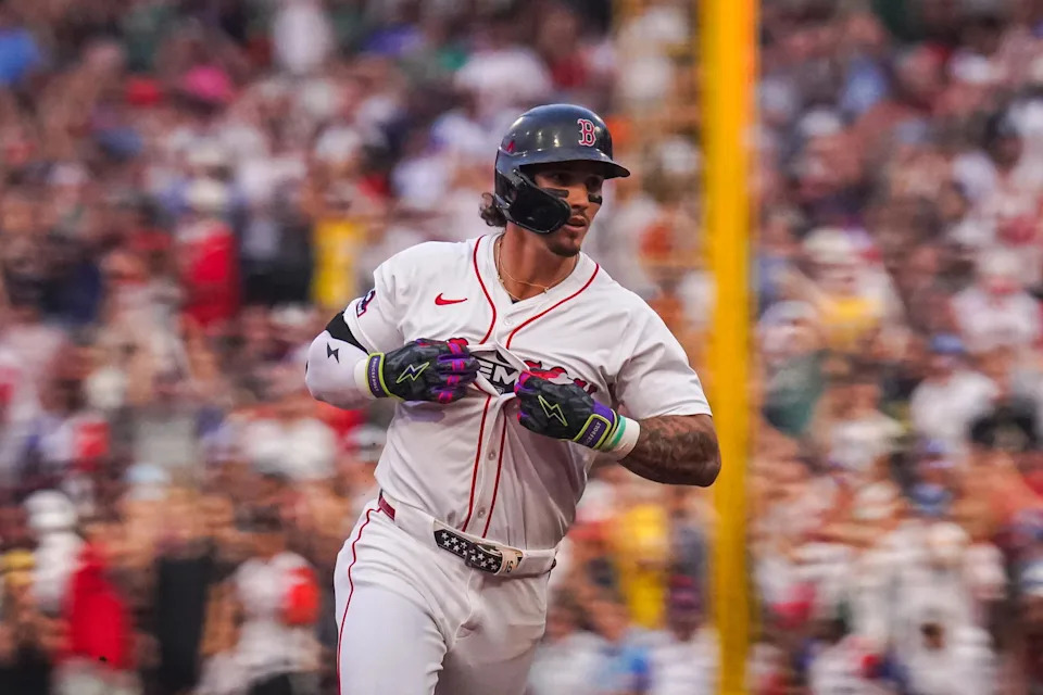 Aug 4, 2025; Boston, Massachusetts, USA; Boston Red Sox outfielder Jarren Duran (16) hits a three run home run against the Kansas City Royals in the first inning at Fenway Park. (David Butler II/Imagn Images)