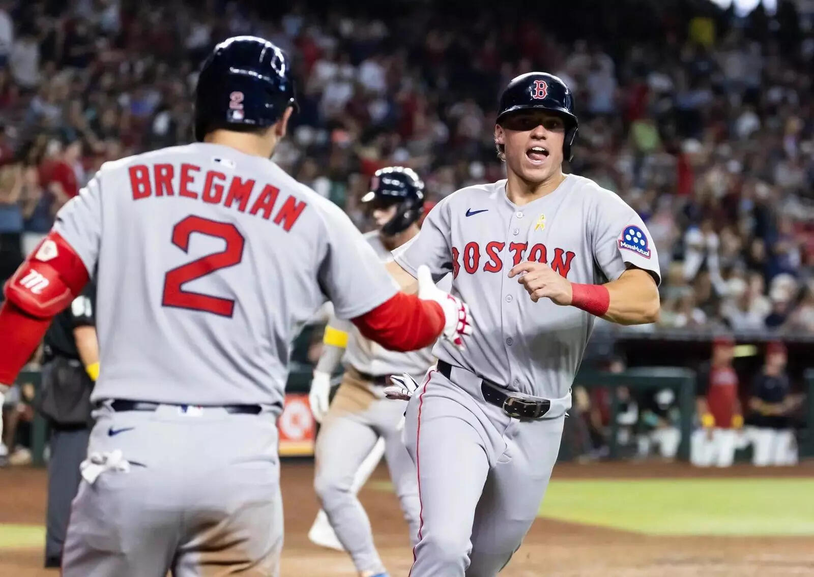 Boston Red Sox base runner Nate Eaton (right) celebrates with Alex Bregman after scoring in the ninth inning (Image via Imagn) Boston Red Sox base runner Nate Eaton (right) celebrates with Alex Bregman after scoring in the ninth inning