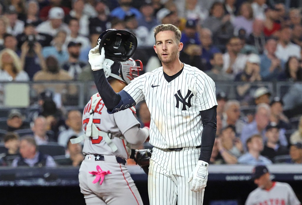 New York Yankees third baseman Ryan McMahon #19 throws his helmet after he strikes out With the bases loaded ending the fifth inning.