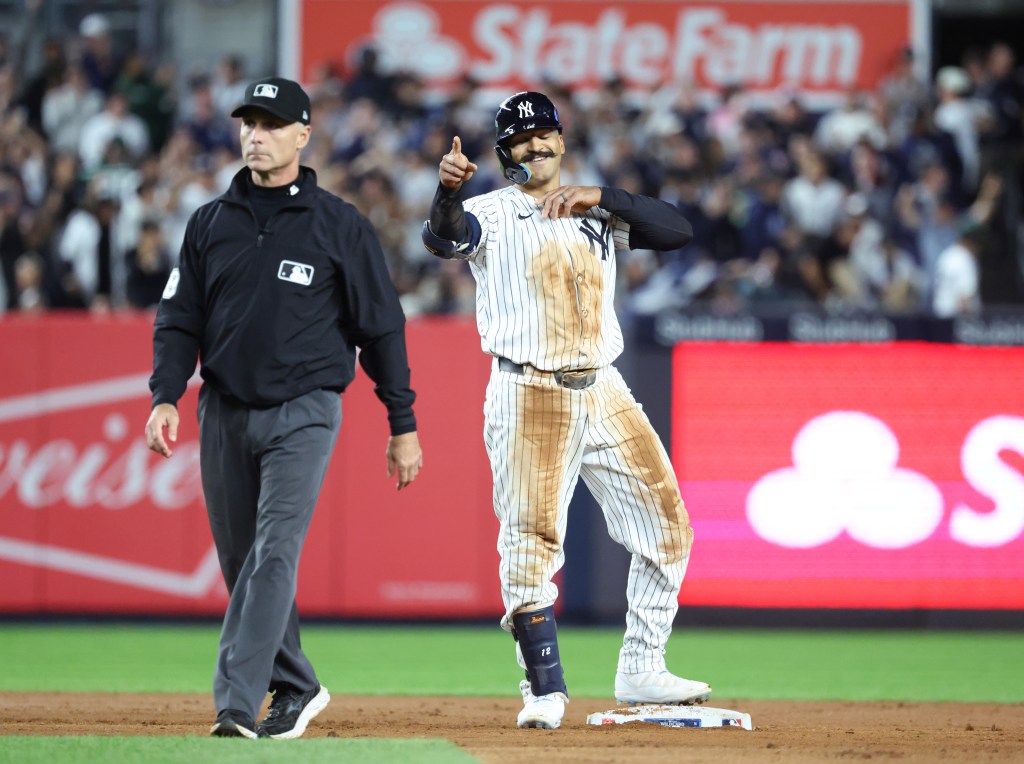 Trent Grisham #12 of the New York Yankees reacts after he hits a double during the 7th inning. The New York Yankees defeat the Boston Red Sox 4-3.