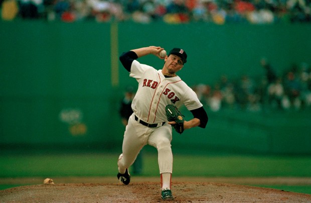 Red Sox star Roger Clemens prepares to make a pitch during a 1986 game in Boston. (AP Photo)
