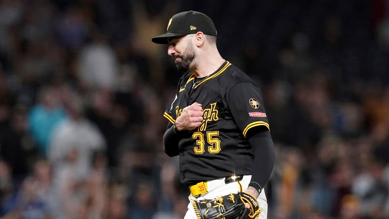 FILE - Pittsburgh Pirates pitcher Colin Holderman celebrates after getting the final out of a baseball game against the Los Angeles Dodgers, Sept. 4, 2025, in Pittsburgh. (AP Photo/Matt Freed, File)