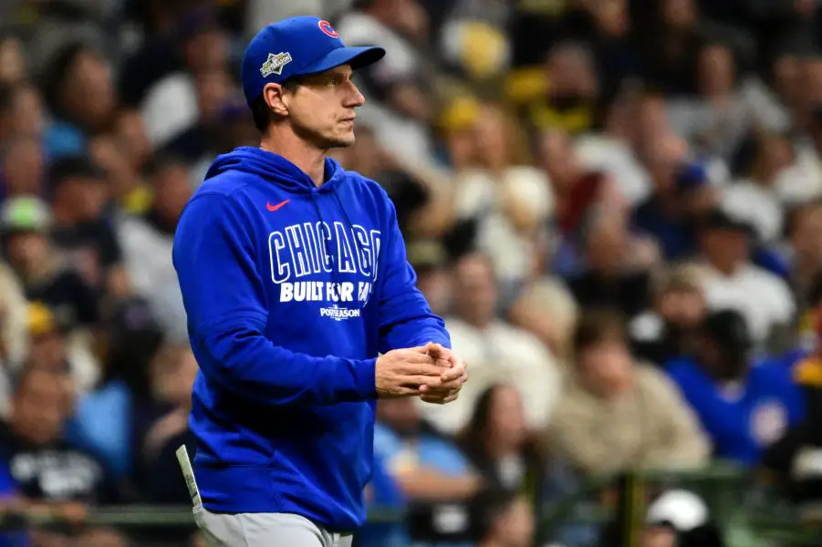 Oct 11, 2025; Milwaukee, Wisconsin, USA; Chicago Cubs manager Craig Counsell (11) walks to the mound in the sixth inning against the Milwaukee Brewers during game five of the NLDS round for the 2025 MLB playoffs at American Family Field. Mandatory Credit: Benny Sieu-Imagn Images