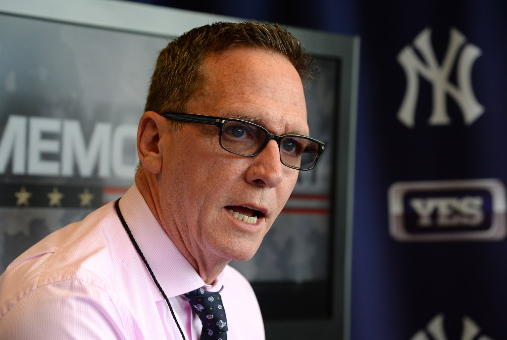 David Cone speaking during an interview at Yankee Stadium.