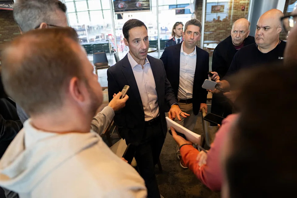 Nov 10, 2023; Cleveland, OH, USA; Cleveland Guardians president of baseball operations Chris Antonetti, middle, talks to the media during an introductory press conference for new manager Stephen Vogt at Progressive Field. Mandatory Credit: Ken Blaze-Imagn Images
