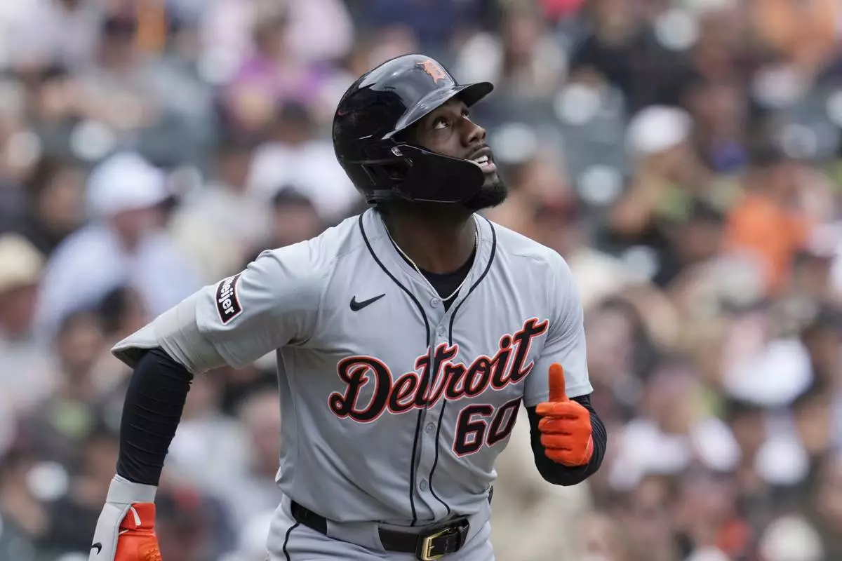 FILE - Detroit Tigers' Akil Baddoo watches the flight of the ball during a baseball game against the San Francisco Giants Aug. 11, 2024, in San Francisco. (AP Photo/Godofredo A. Vásquez, File)