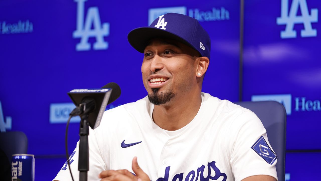 Edwin Díaz speaks during his introduction as a new member of the Los Angeles Dodgers baseball team Friday, Dec. 12, 2025, in Los Angeles. (AP Photo/Ethan Swope)